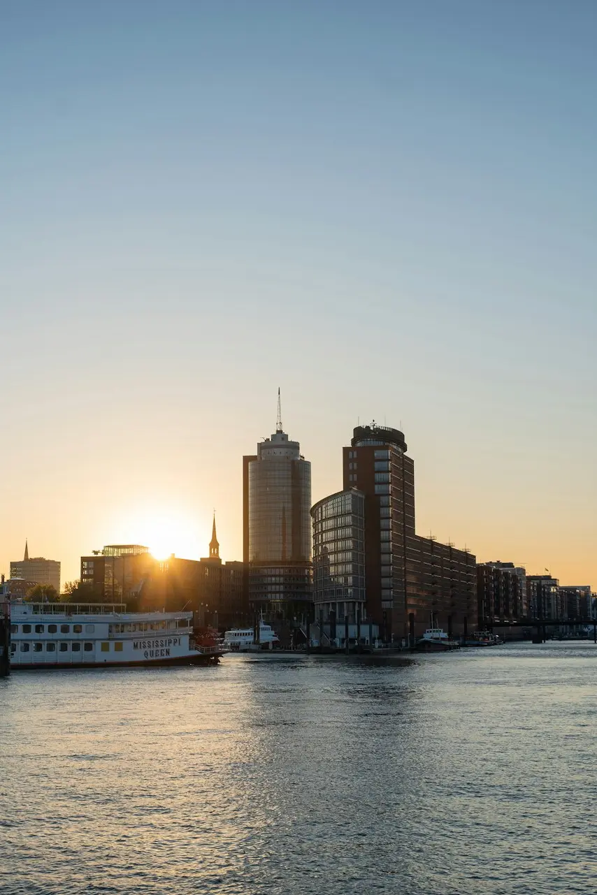 city skyline across body of water during daytime