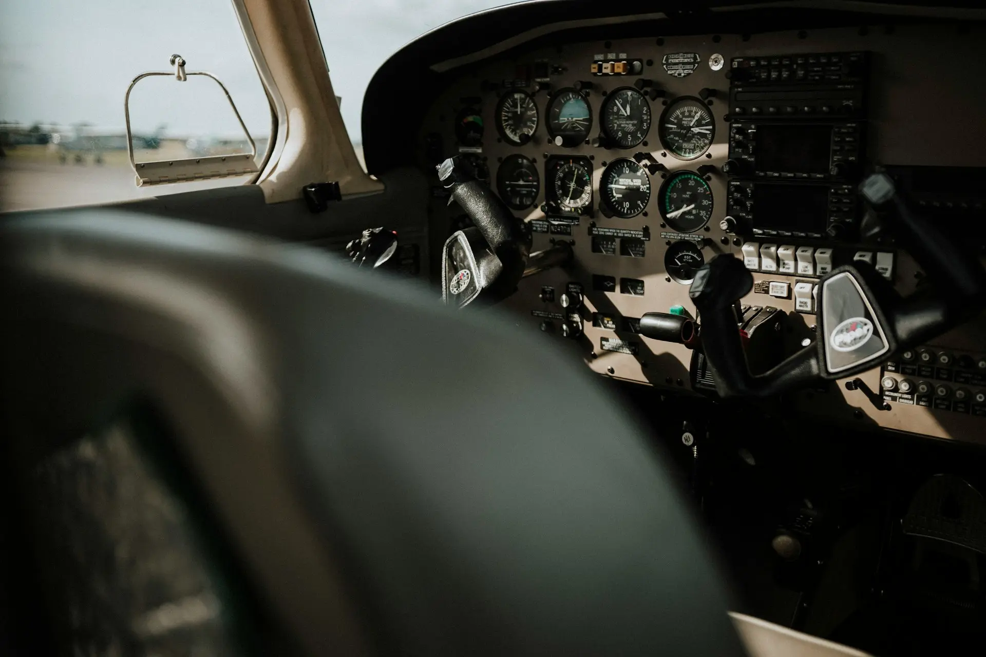 empty aircraft cockpit interior during day